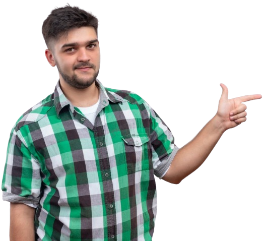 A young male student wearing a green checkered shirt pointing his finger to the right, showcasing affordable driving school options.